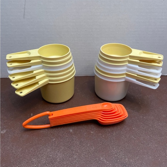 Tupperware Yellow and White Measuring Cups with Orange Spoons - Picture 1 of 3